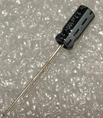 2.2/100V, 105C, Ø5x11mm, ±20%, Kondensatori zemas induktivitātes, Jamicon, 2.265R, 5000h, Jamicon, ar lokaniem izvadiem