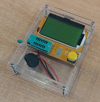 Testu ierīce, korpusā, (barošana 1 baterija 9V 6F22), kapacitate(ESR), rezistori, tranzistori(N, P, NPN, PNP), diodes