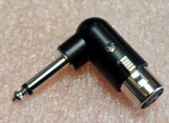 XLR pārēja 3PIN ligzda uz 6.35mm štekers mono, plastmasas korpuss, leņķisks