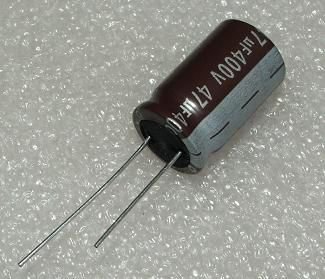 47/400V, 105C, Ø16x25mm, ±20%, Kondensatori zemas induktivitātes, 5000h, Jamicon, ar lokaniem izvadiem