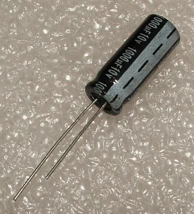 1000/10V, 105C, Ø8x20mm, ±20%, TB serija, Kondensatori zemas induktivitātes, 63mR, 6000h, Jamicon, ar lokaniem izvadiem