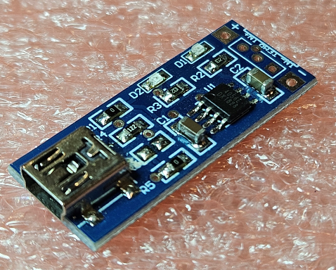 Modulis: Li-po/li-ion uzlādēšanas ierīce, 1 baterija, TP4056, 4.2VDC, 1A, miniUSB-B, 39x15x6mm