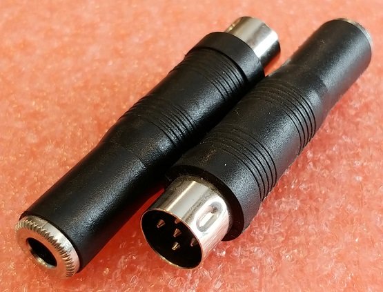 6.35mm ligzda stereo uz 5DIN štekers