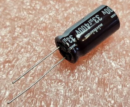 33/400V, 105C, Ø12.5x25mm, ±20%, Kondensatori zemas induktivitātes, 12000h, NICHICON, ar lokaniem izvadiem