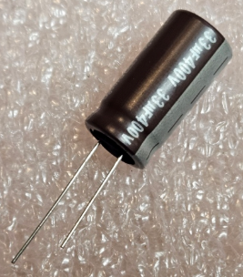 33/400V, 105C, Ø12.5x25mm, ±20%, Kondensatori zemas induktivitātes, 5000h, Jamicon, ar lokaniem izvadiem